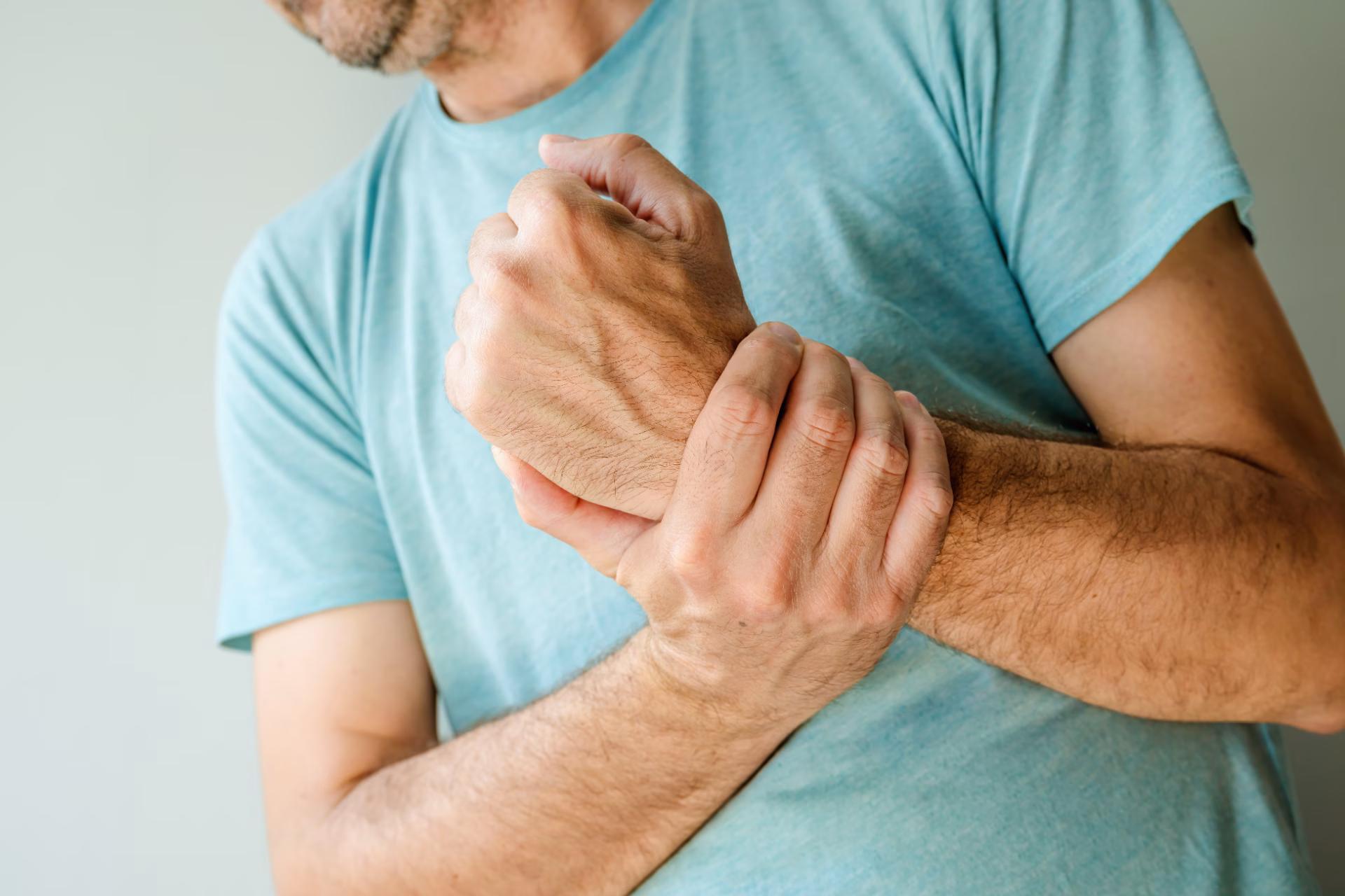 severe wrist pain symptoms man with painful medic 2026 03 25 03 25 14 utc converted