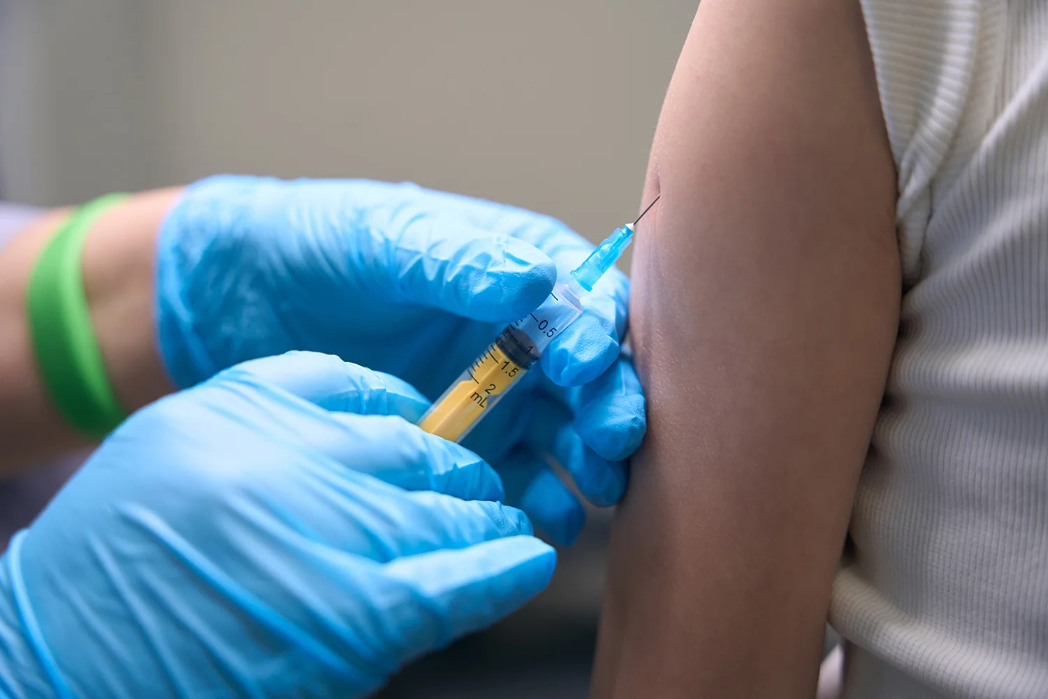vaccination of a child with a syringe